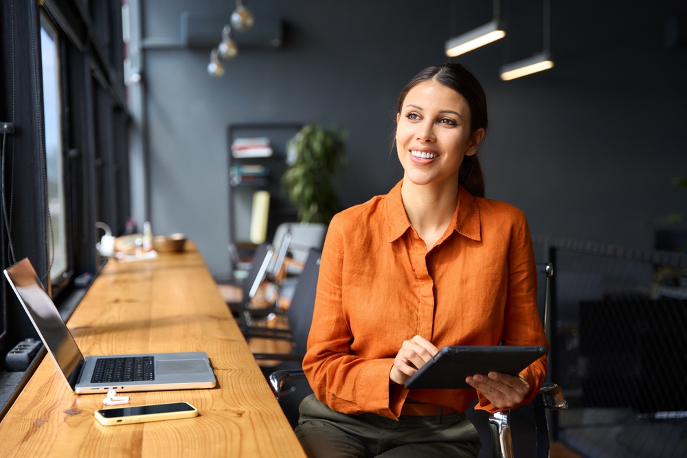 Woman using AI app on tablet