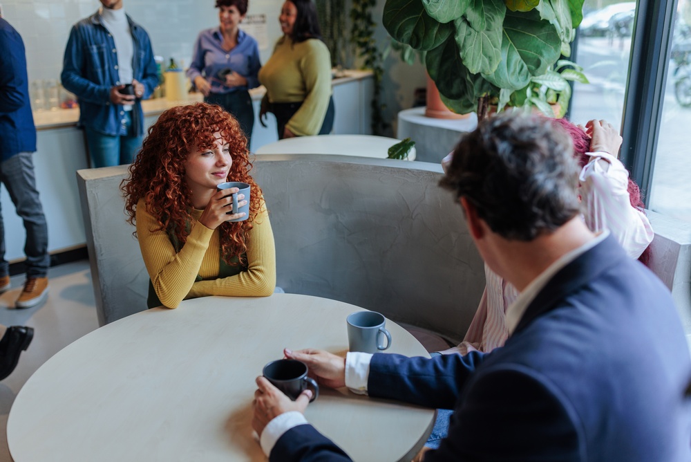 People talking at coworking space