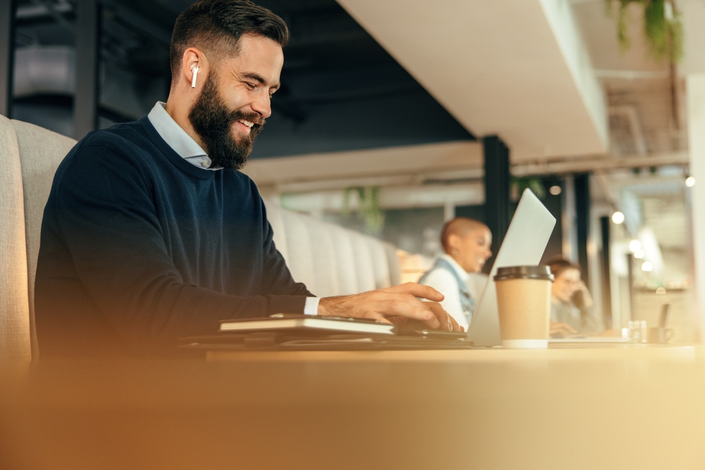 Real estate agent working at coworking space