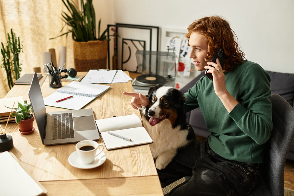 Man working from home with his dog