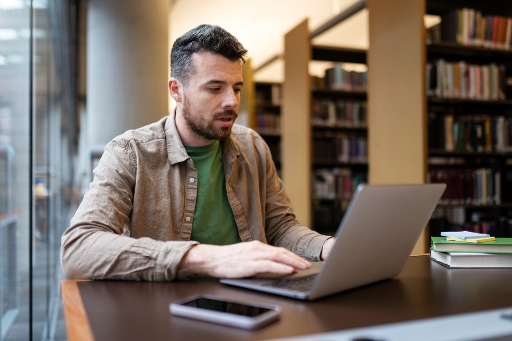 Man working in library