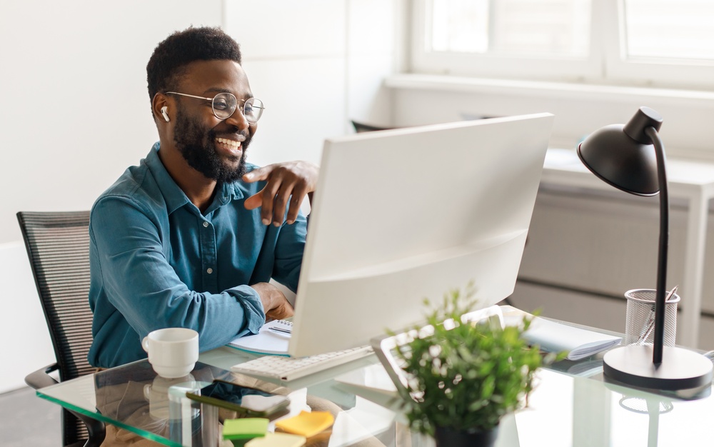 Man in office using computer