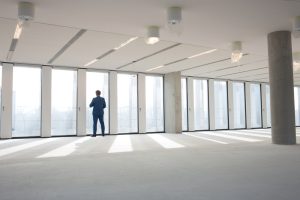 Man viewing an empty office for rent in Northridge CA