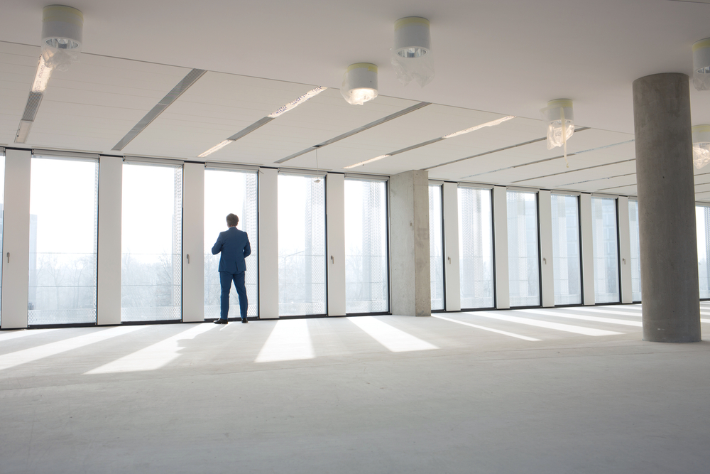 Man viewing an empty office for rent in Northridge CA
