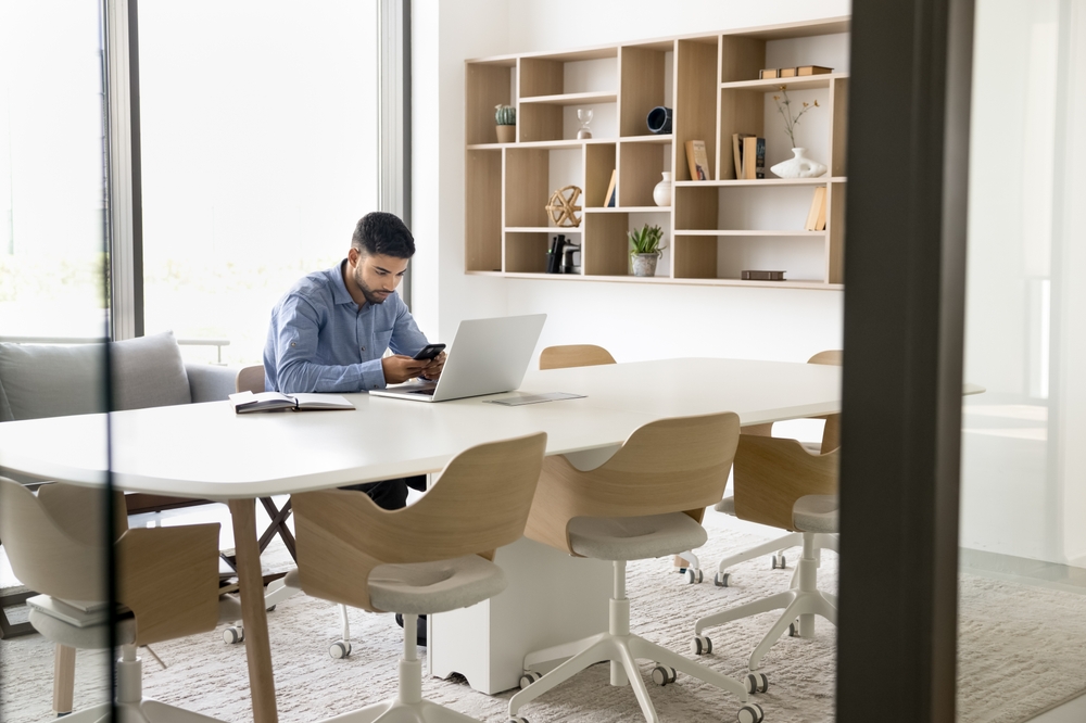 Man working in big office