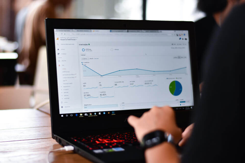 Man looking at trends and keywords on computer