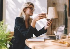 Woman running small business from desk