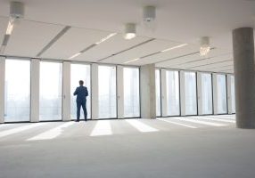 Man viewing an empty office for rent in Northridge CA