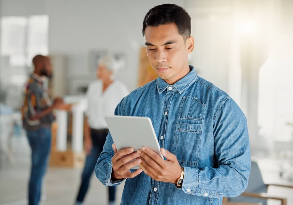 man holding tablet