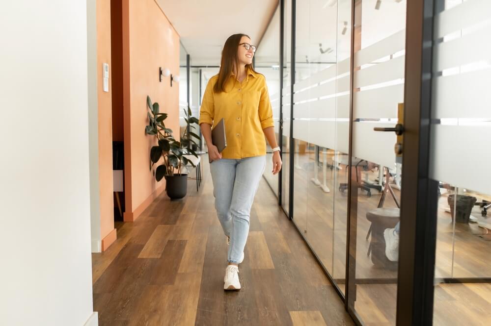 woman walking hallway