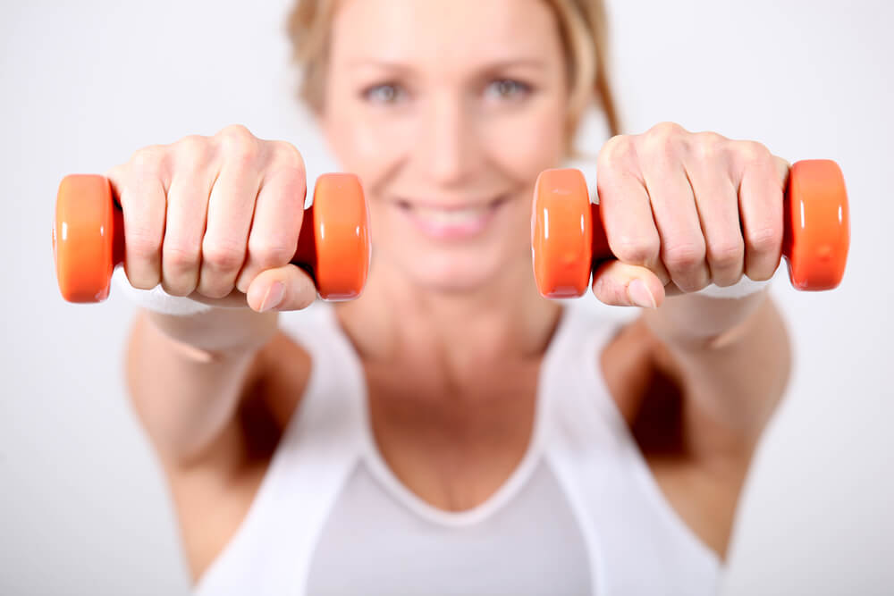 woman holding weights