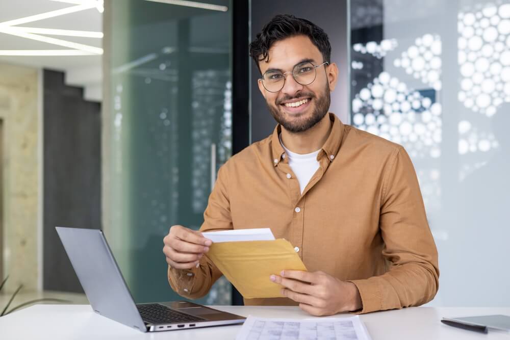 man holding mail